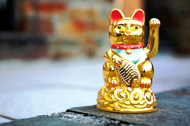 Amuletos chinos de la suerte, El gato chino que significa